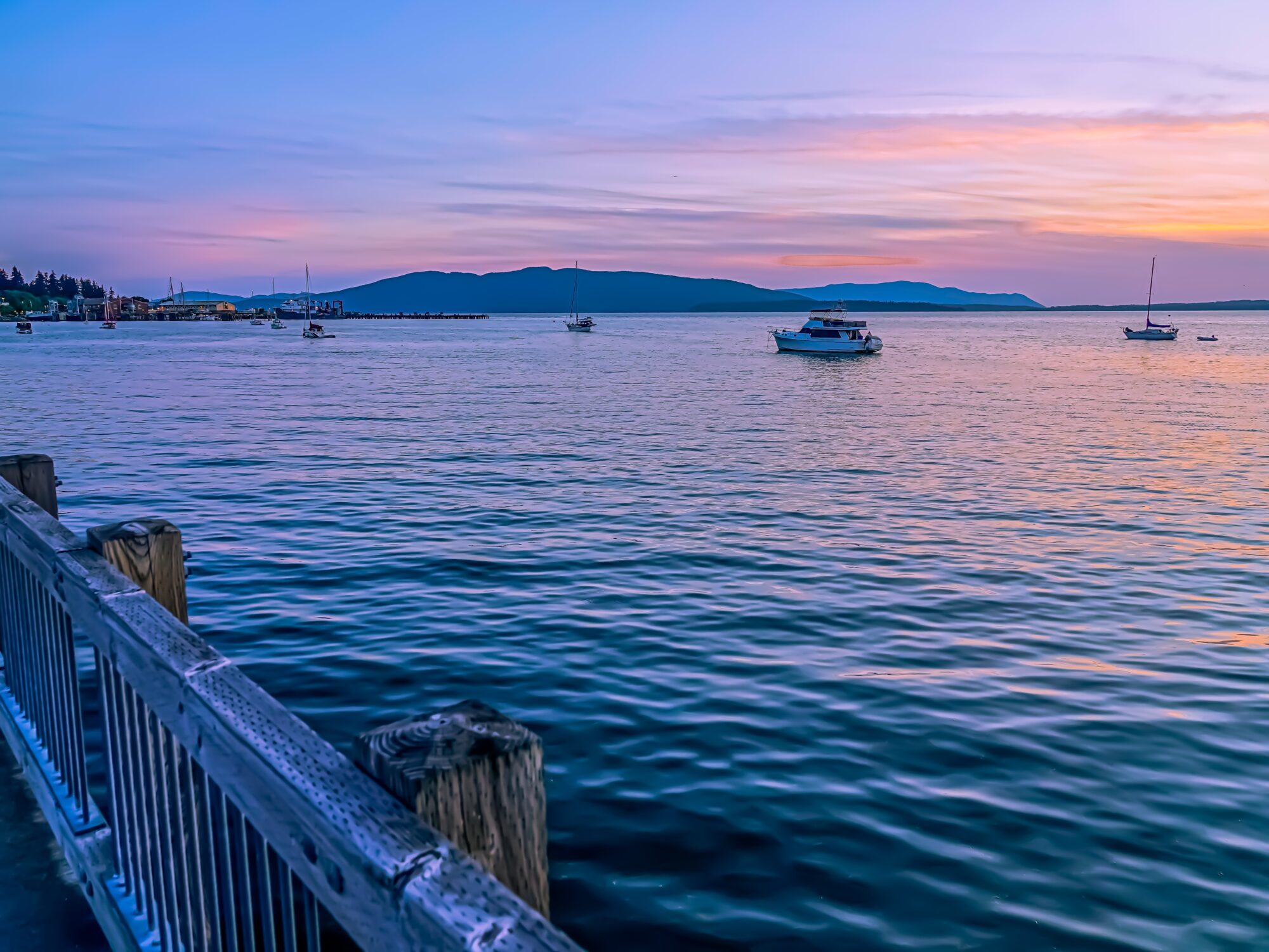 bellingham bay from taylor dock attracting tourists with colorful coastal sunset
